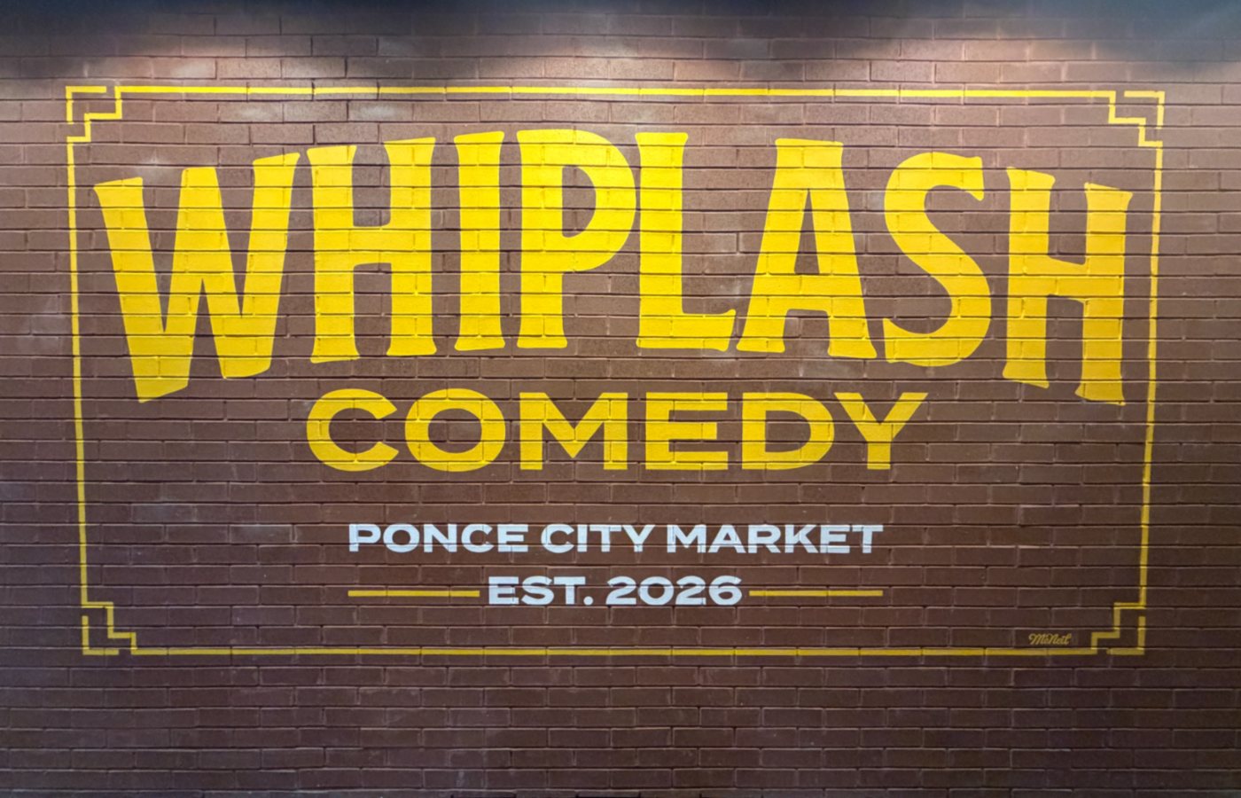 Whiplash Comedy sign painted on brick, reading Ponce City Market, Est. 2026.